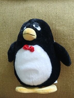 Disney Black & White Penguin Plush with Red Bow. From Toy story Movie.